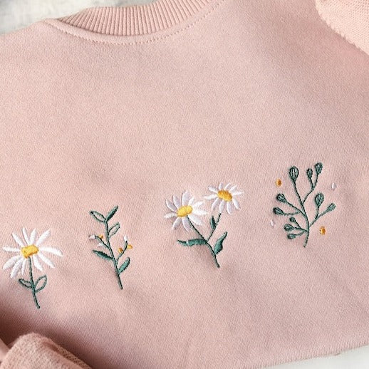 Pink daisy embroidered crewneck sweatshirt embroidered