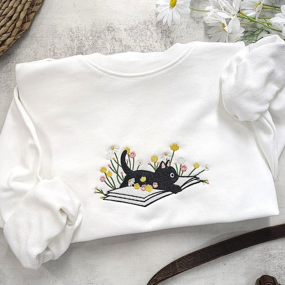 Cute Lying On The Book Cat Embroidered Sweatshirt