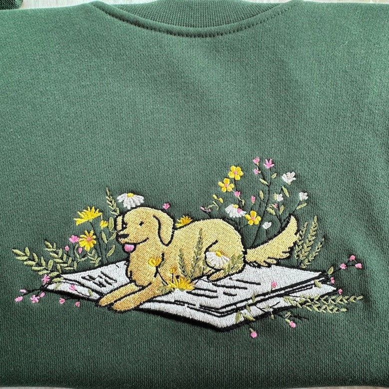 Embroidered Cute Dog Lying On Book With Flower Sweatshirt